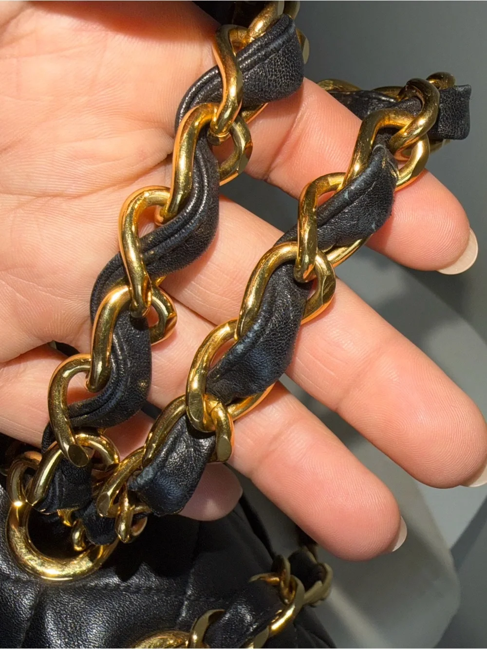 CHANEL Black Quilted Shoulder Bag with Gold Chain & CC Lock